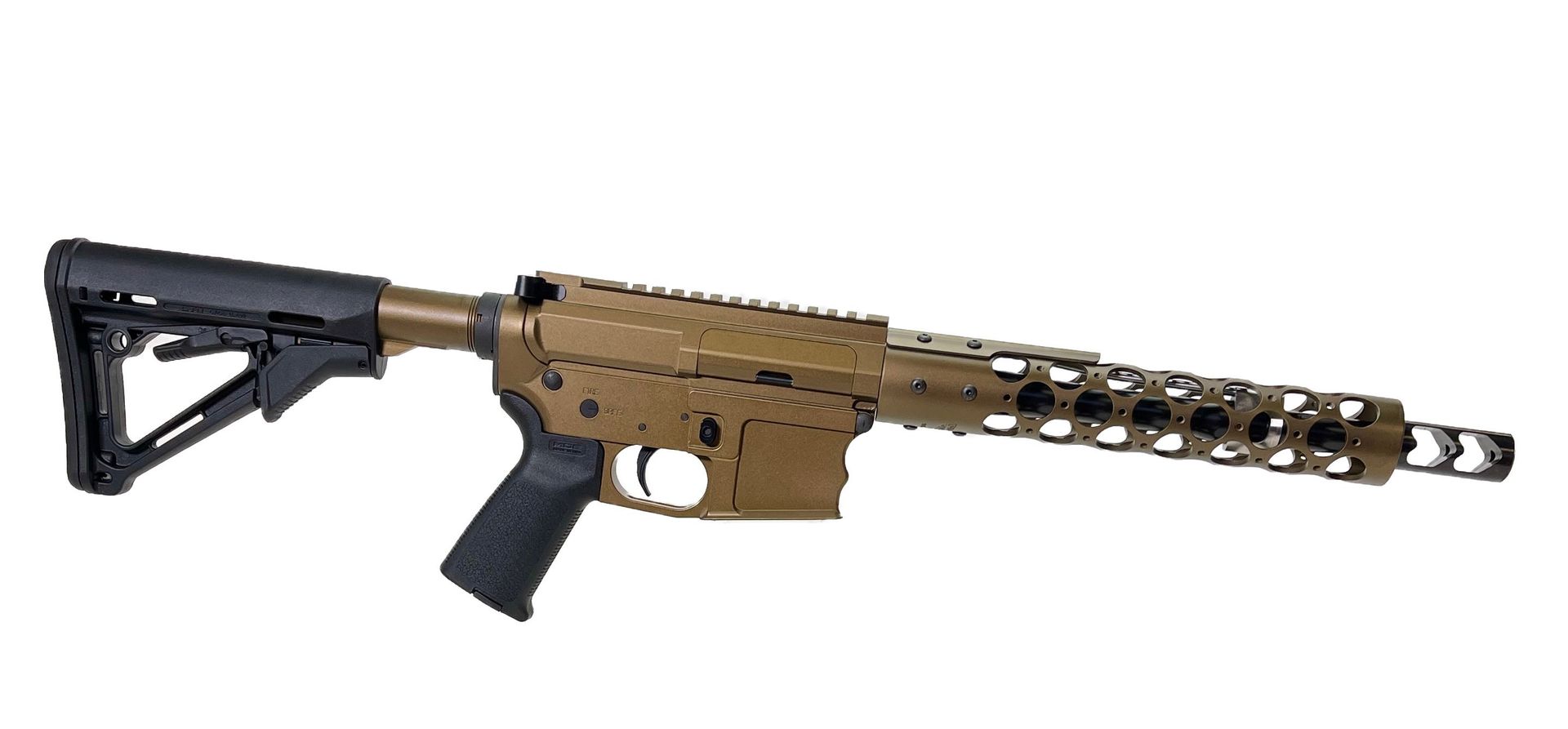 A bronze-colored rifle with a black grip and stock, set against a white background.