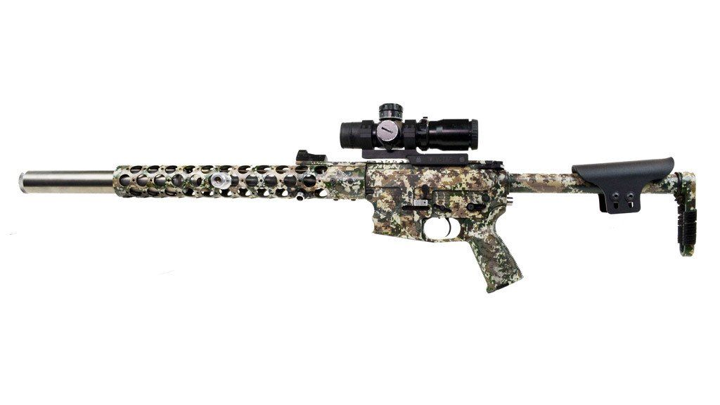 Camouflage rifle with scope, long barrel, and adjustable stock.