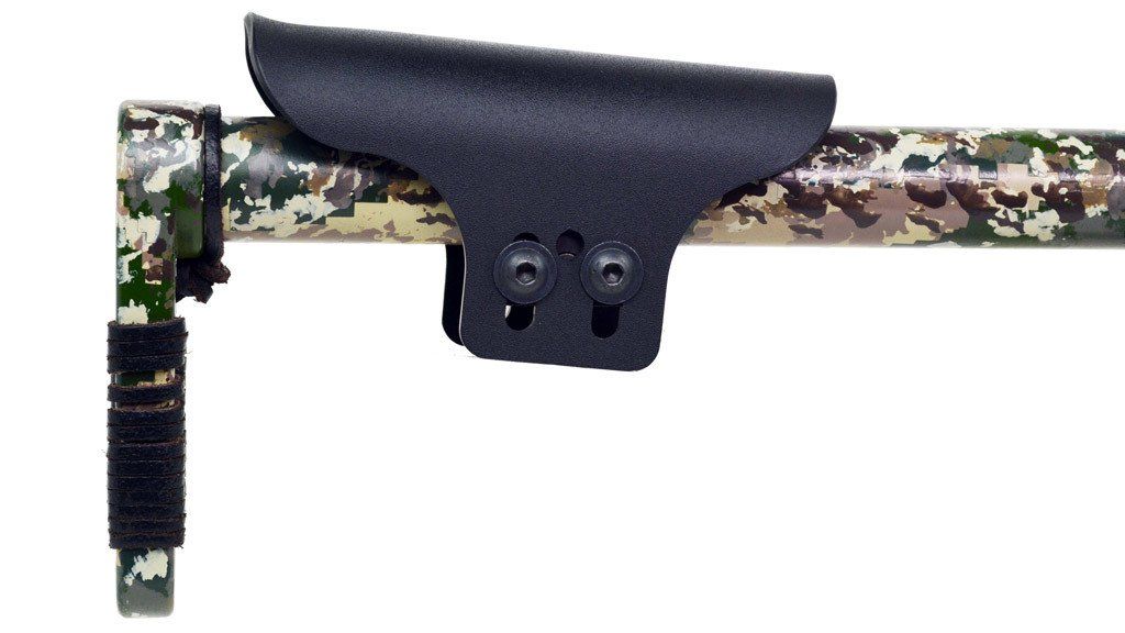 Black leather rest attached to a camouflage pole, held together with screws and straps.