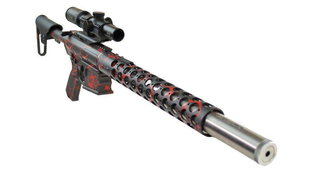 Red and black rifle with scope and silencer, against a white background.