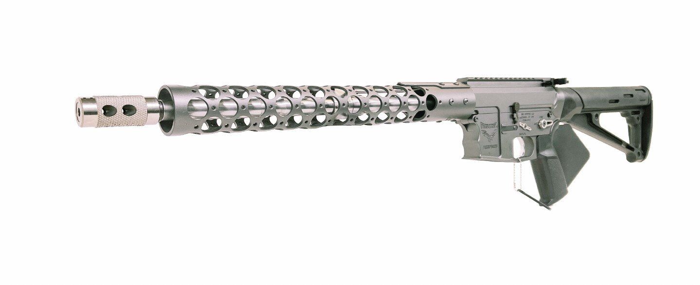 Silver rifle with a complex barrel design, against a white background.