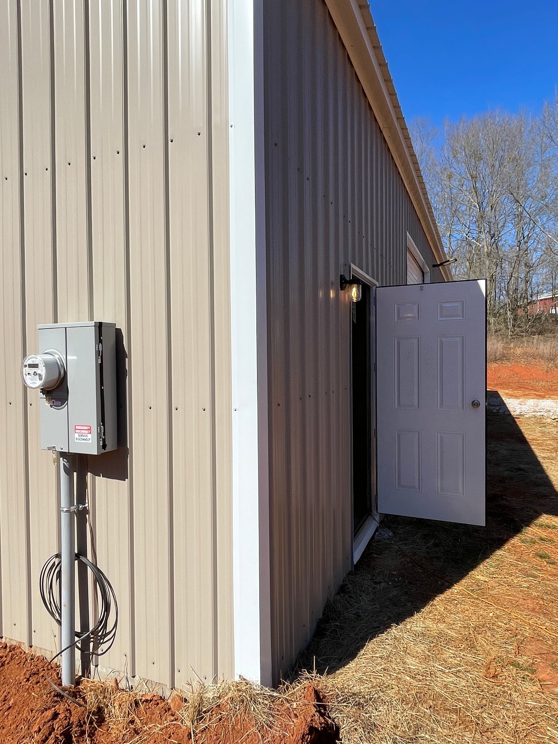 A commercial electrical panel installation in Gainesville, GA by Professional Design Systems crew