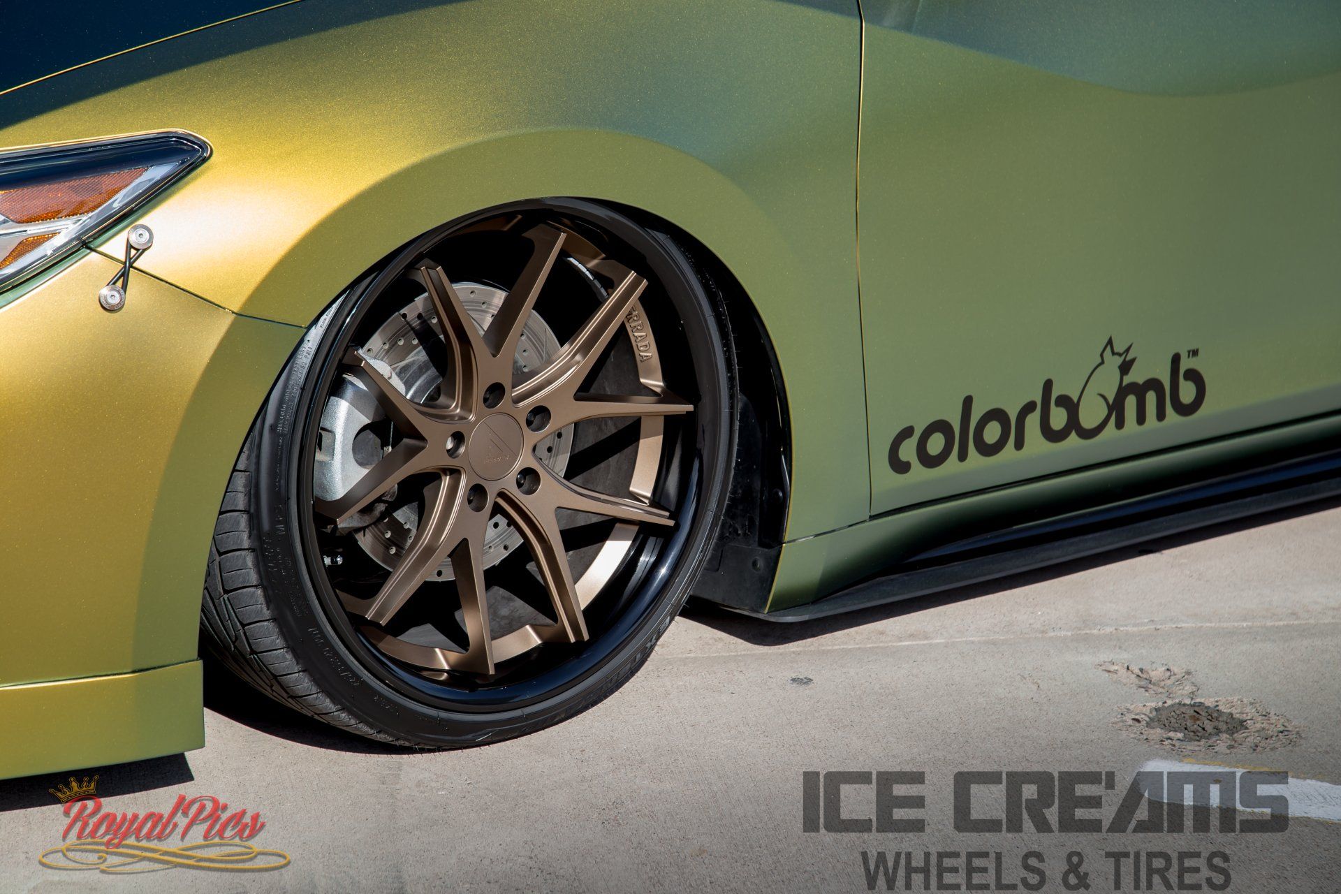 Custom lime-green sports car with bronze rims and “colorbömb” decal at Ice Creams Wheels & Tires shop