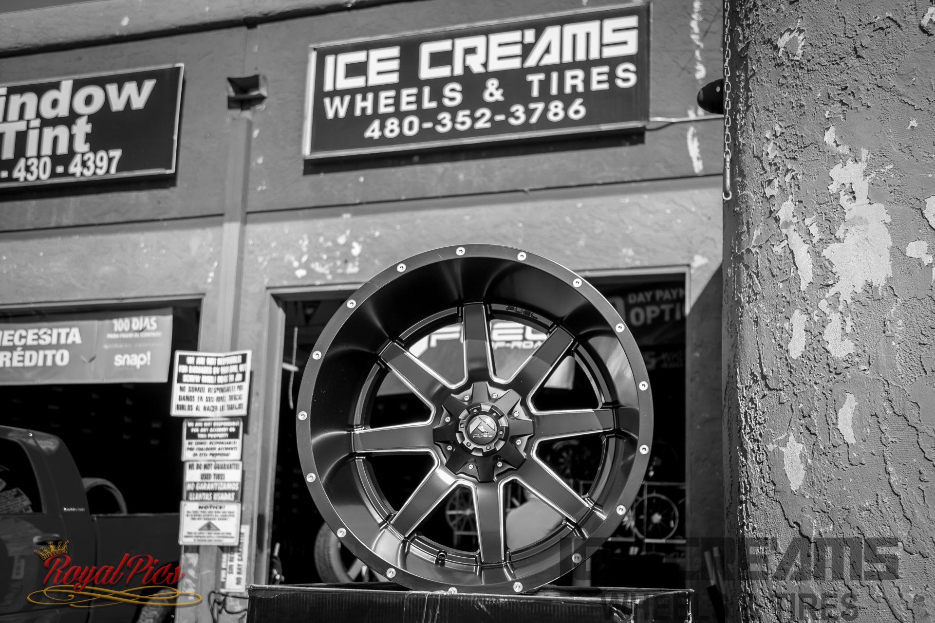 Storefront with a custom chrome wheel display for Ice Creams Wheels & Tires.