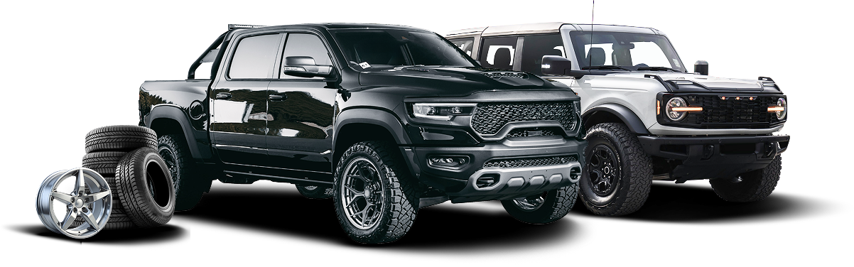Black pickup trucks and a spare tire on a white background, shown in a product-style display