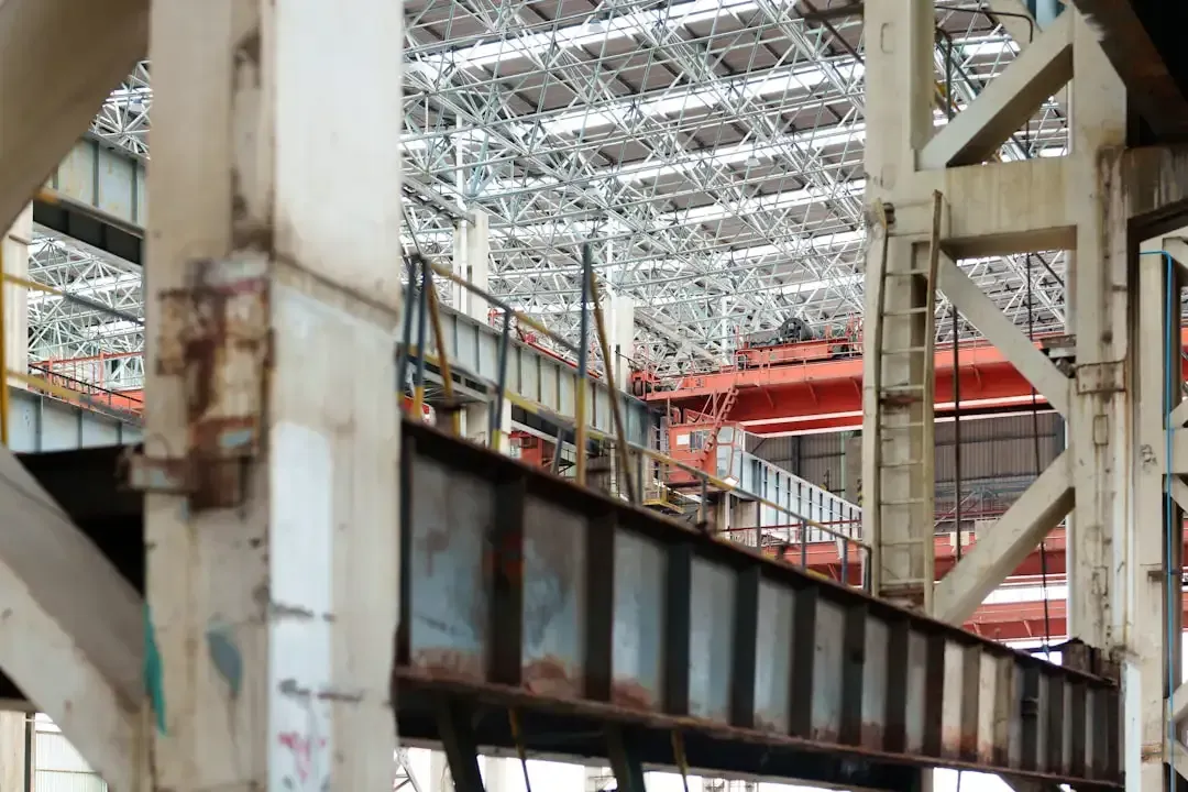 High-dusting and structural beam cleaning in a manufacturing facility