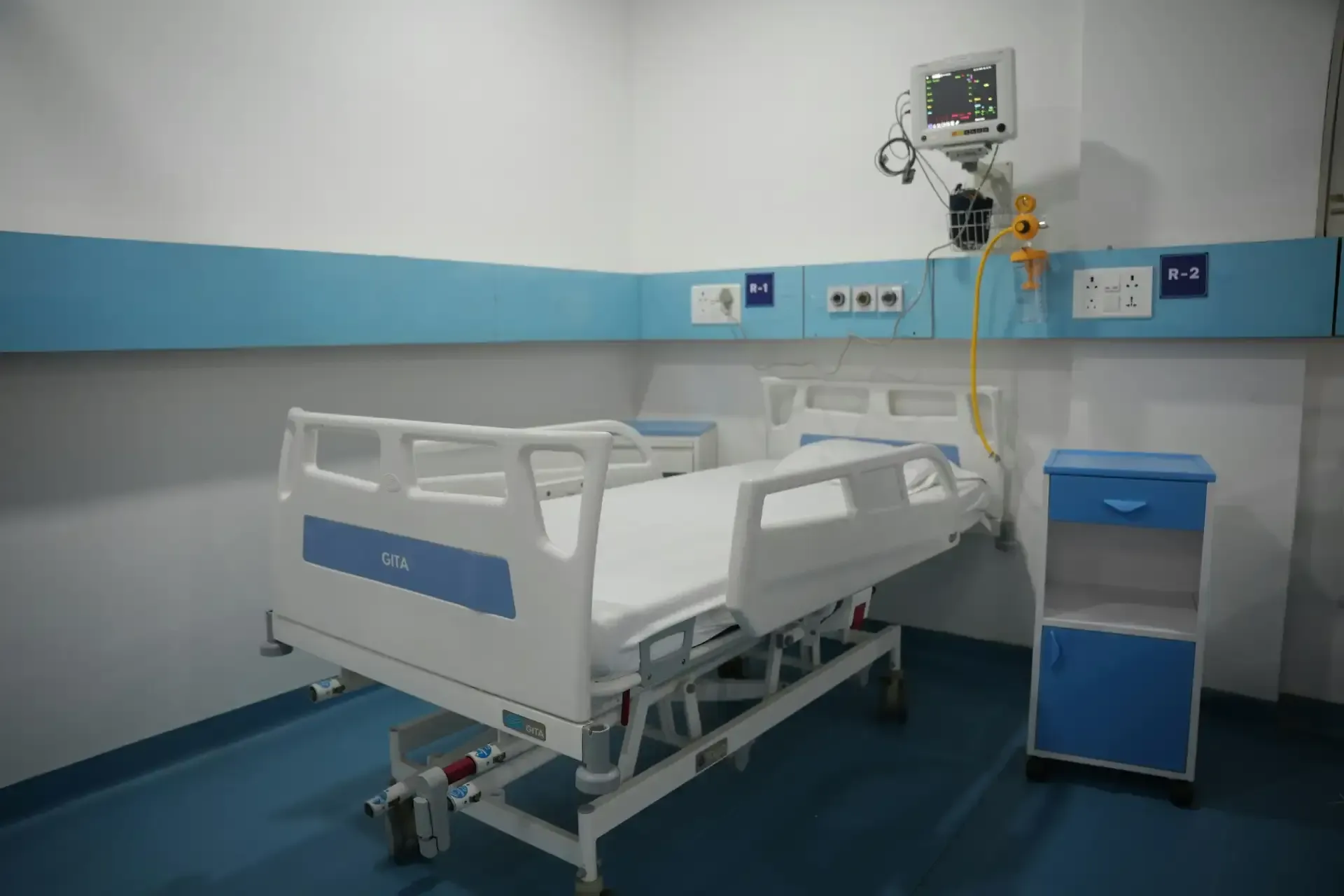 A clean and sterile medical facility exam room ready for patient care