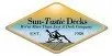 A logo for sun-tastic decks