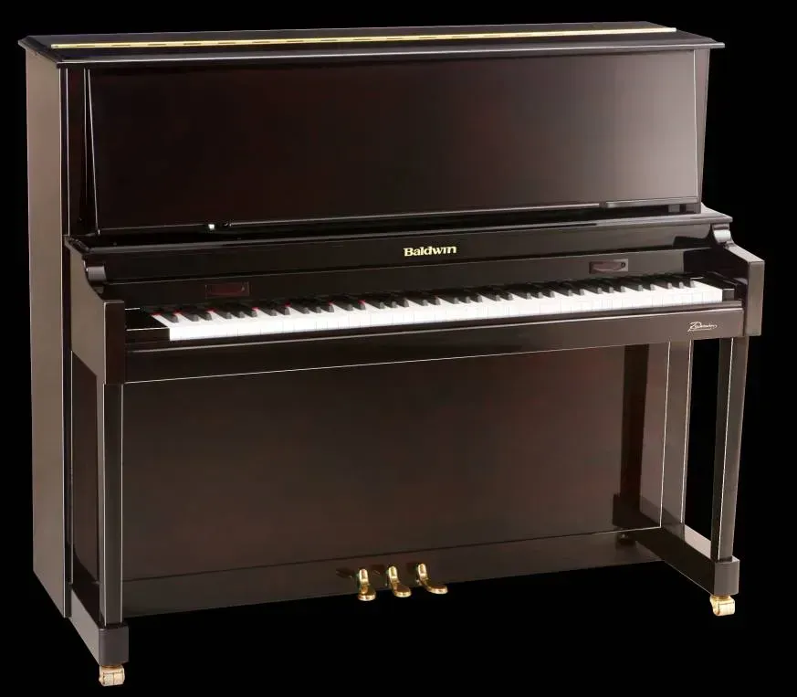 A piano with a black background and the word tubular on it