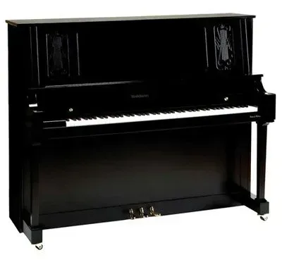 A black upright piano with white keys on a white background