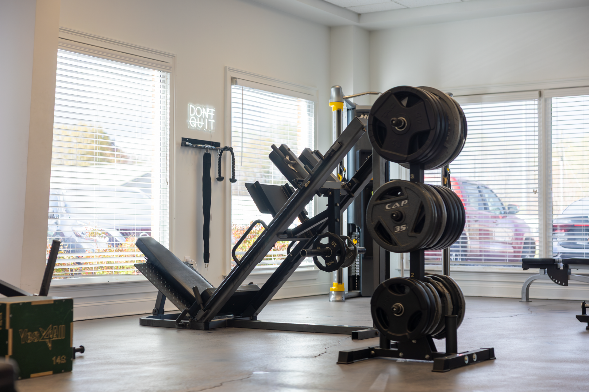 360 Image Fitness black gym equipment in a brightly lit room