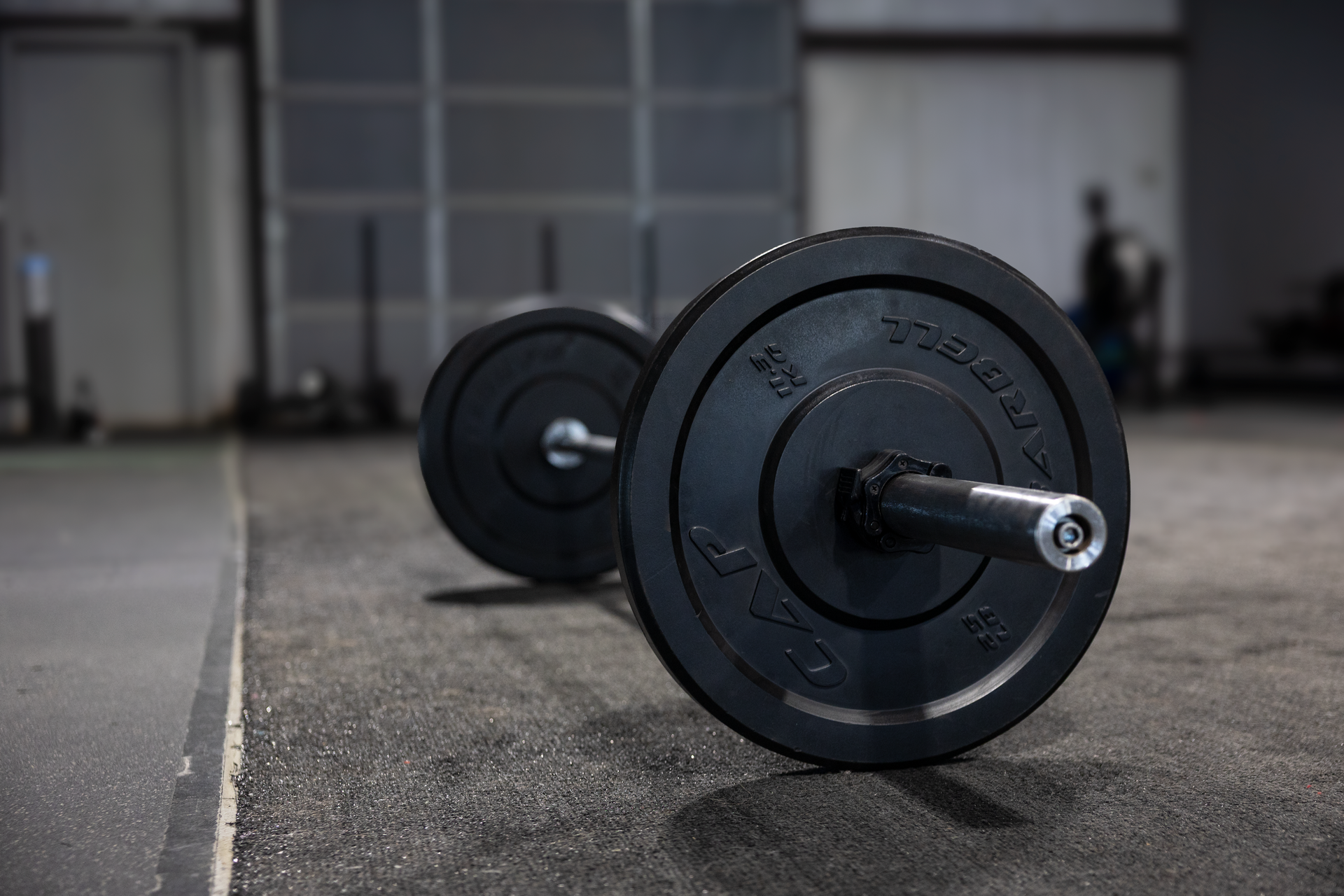 Black weights on silver gym weight bar equipment at 360 image fitness gym in watkinsville, ga