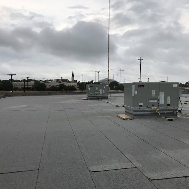 A rooftop with a lot of aircon