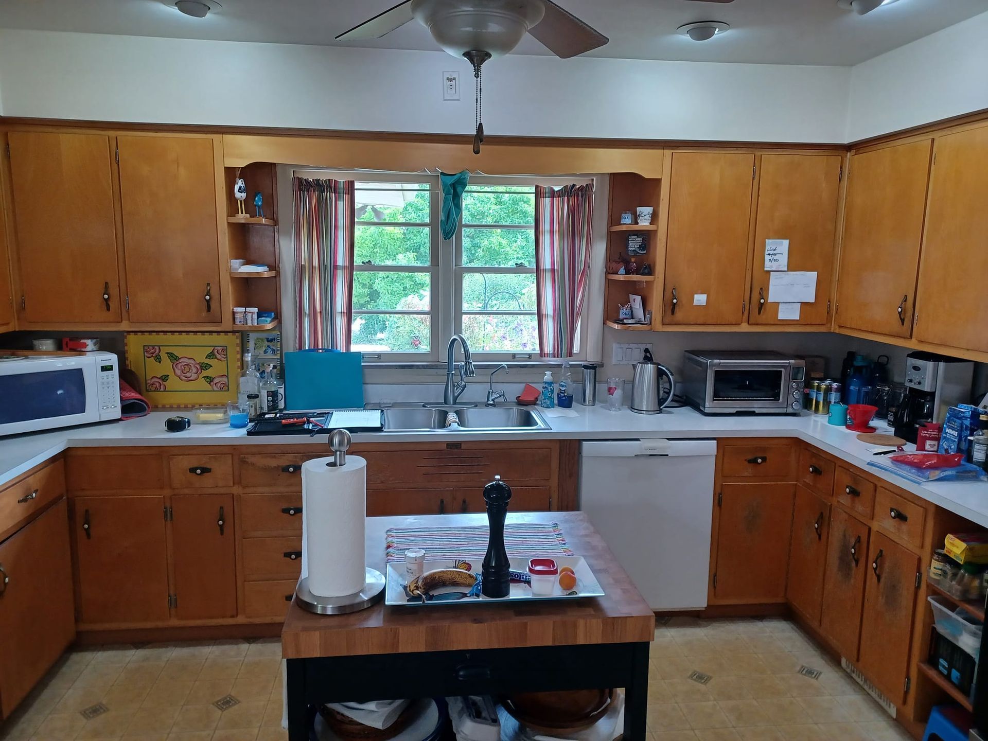 Traditional Kitchen With Warm Wood Cabinetry And Contemporary Stainless Steel Appliances Kitchen Remodel by Red Bird Remodeling project photo 8