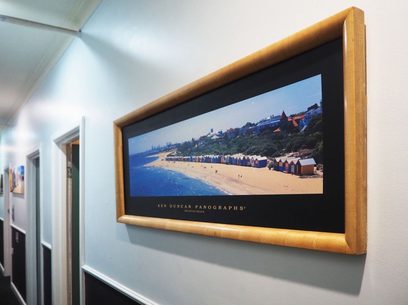 a picture frame next to Pint on Punt's 6-bed mixed dorm room