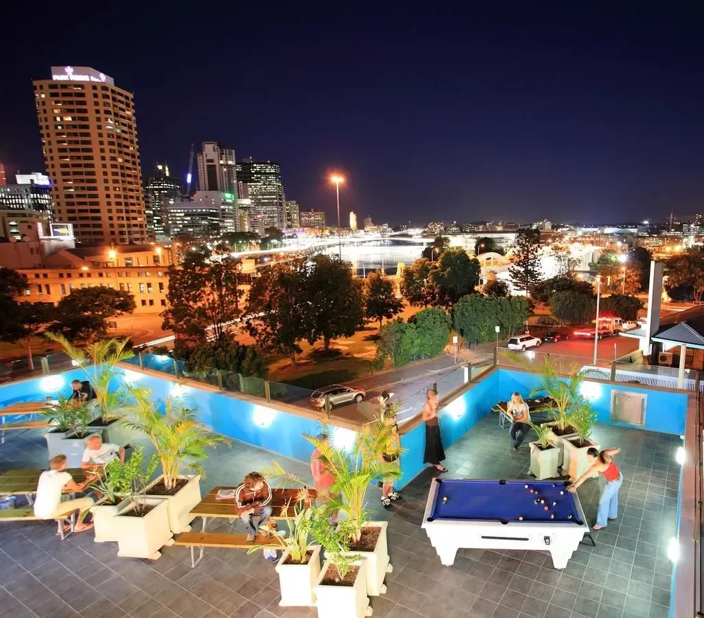 Rooftop gathering at Chill Backpackers - Pint on Punt's Backpackers' Hostel
