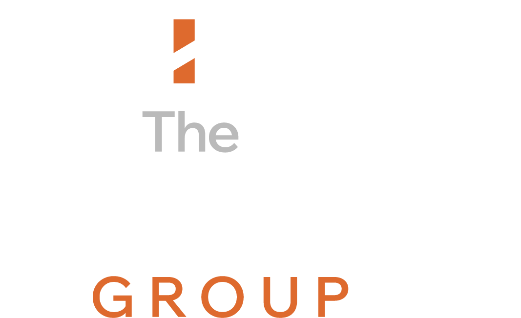 The logo for living in idaho is yellow and orange