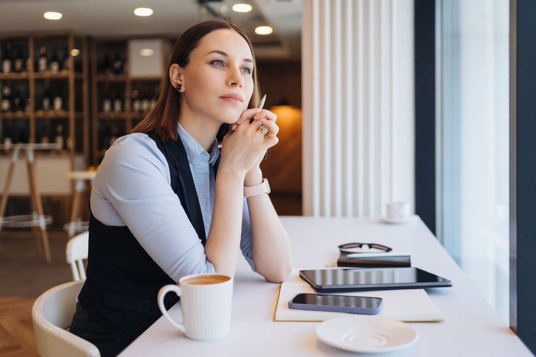 A woman working in a cafe.