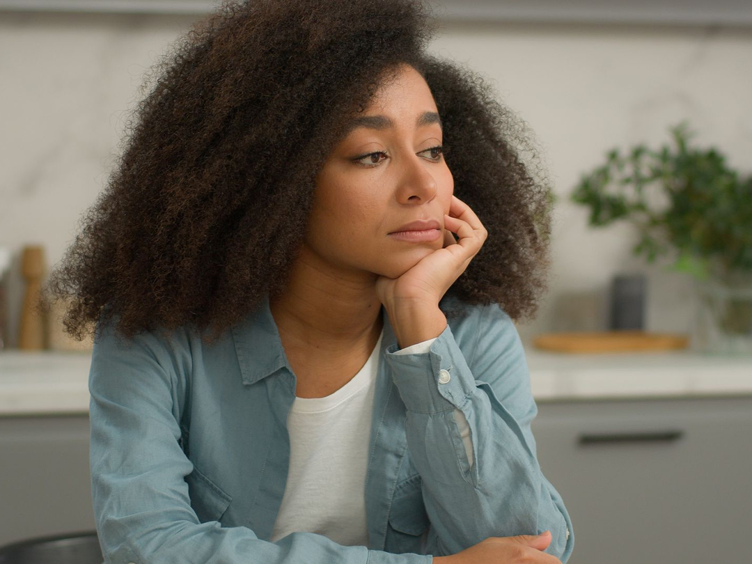 A woman stressing over her eating habit,