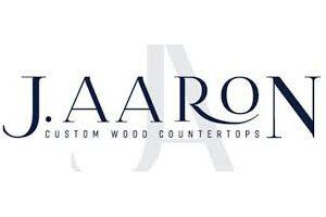 J. Aaron Custom Wood Countertops logo in dark blue on a white background