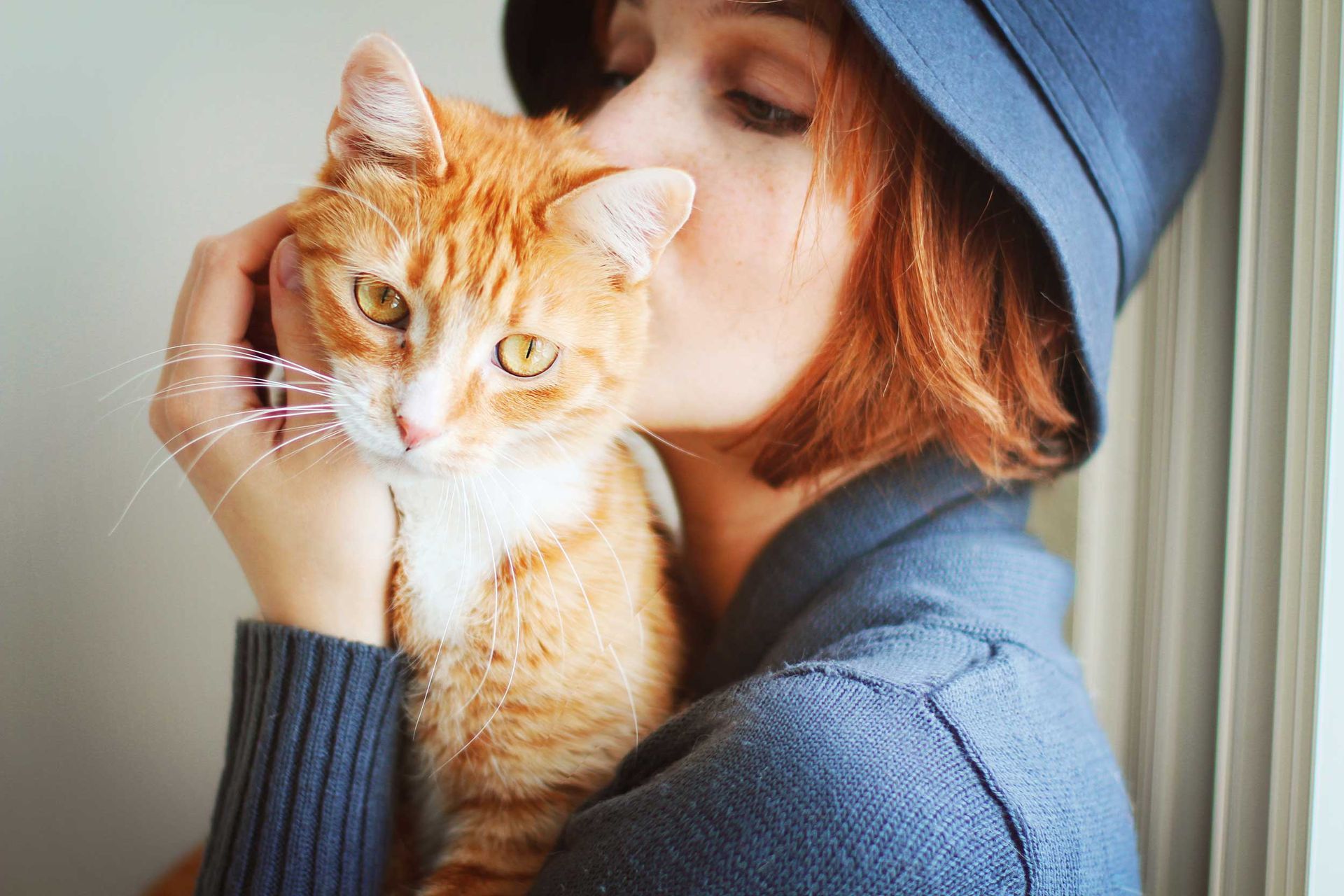Women holding a ginger cat — Aberdeen, WA — Petland Cemetery