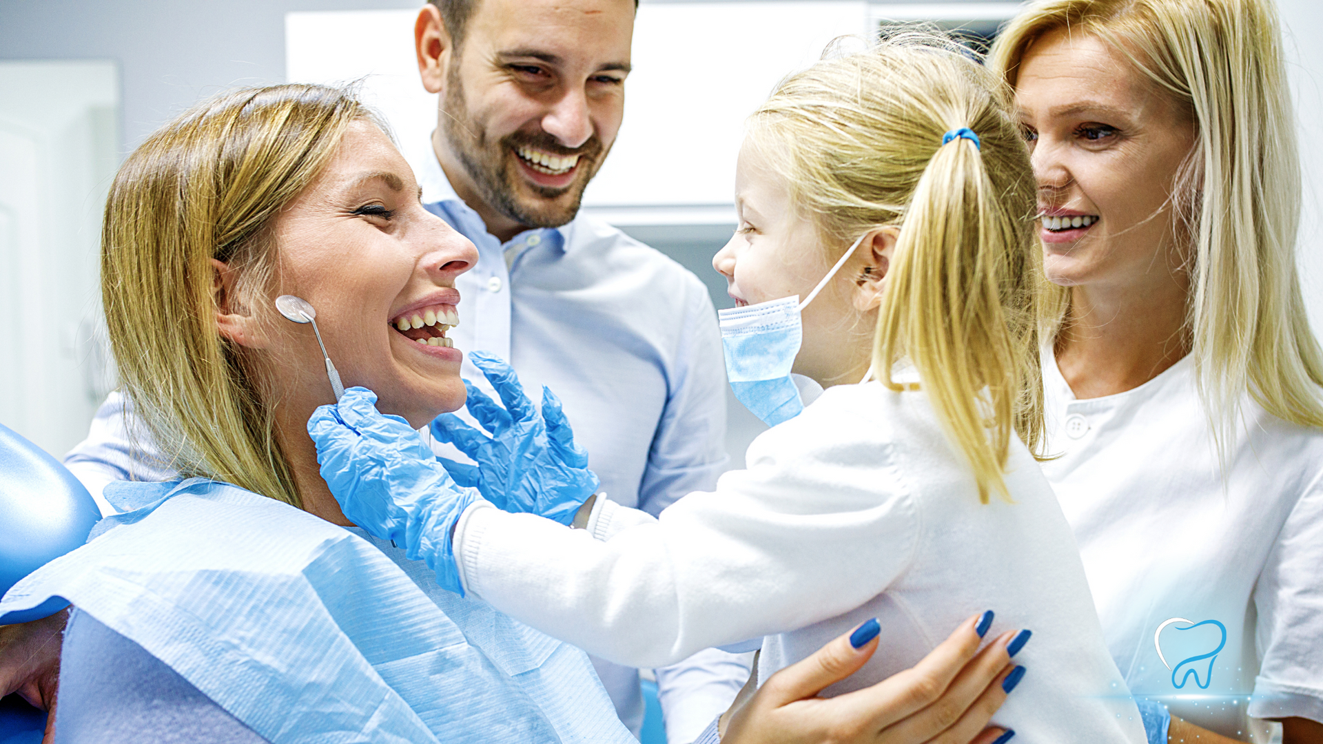 Dentist and assistant examining a smiling patient in a bright dental clinic