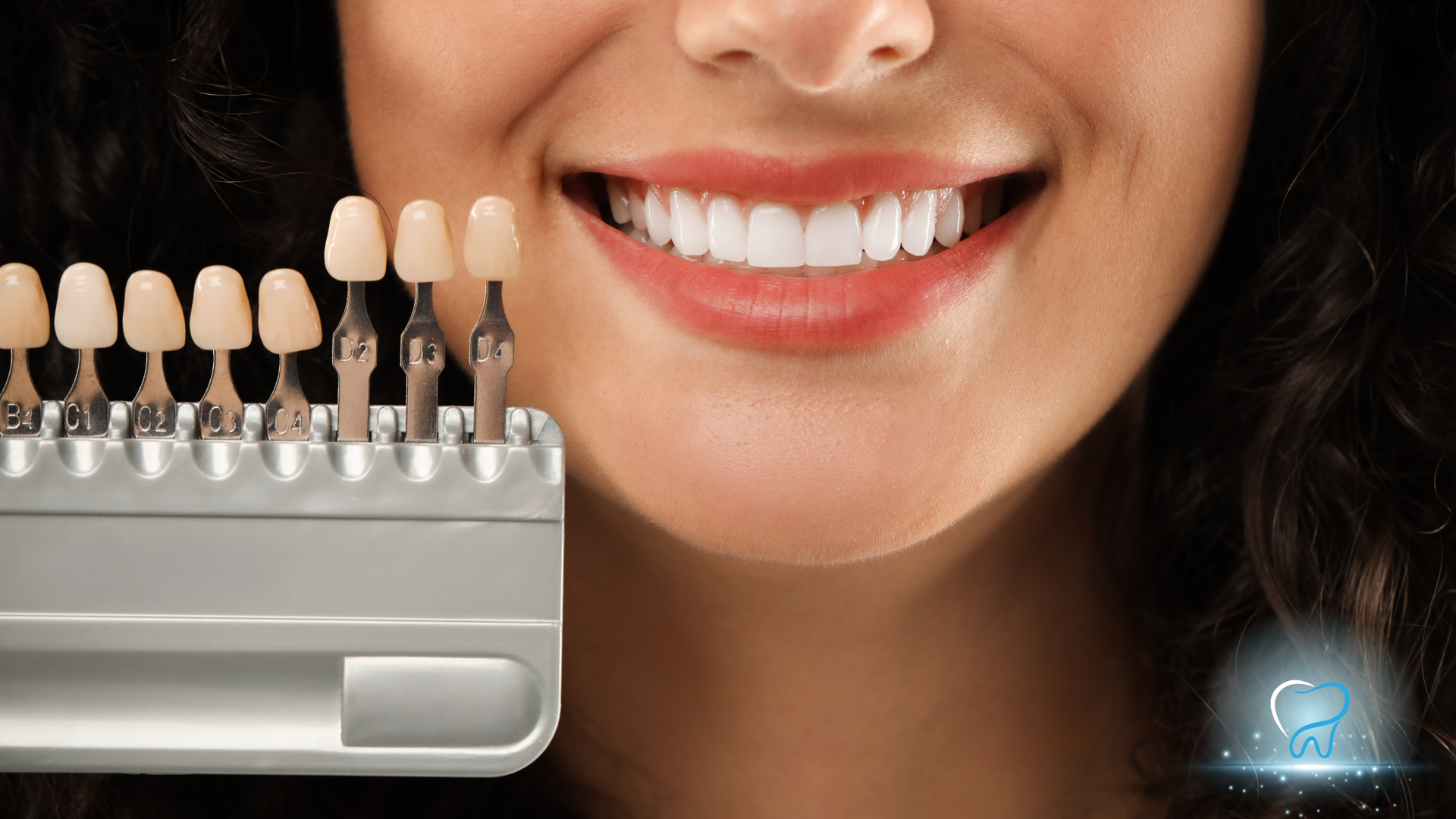 Dental shade guide beside smiling mouth with white teeth, showing tooth color matching.