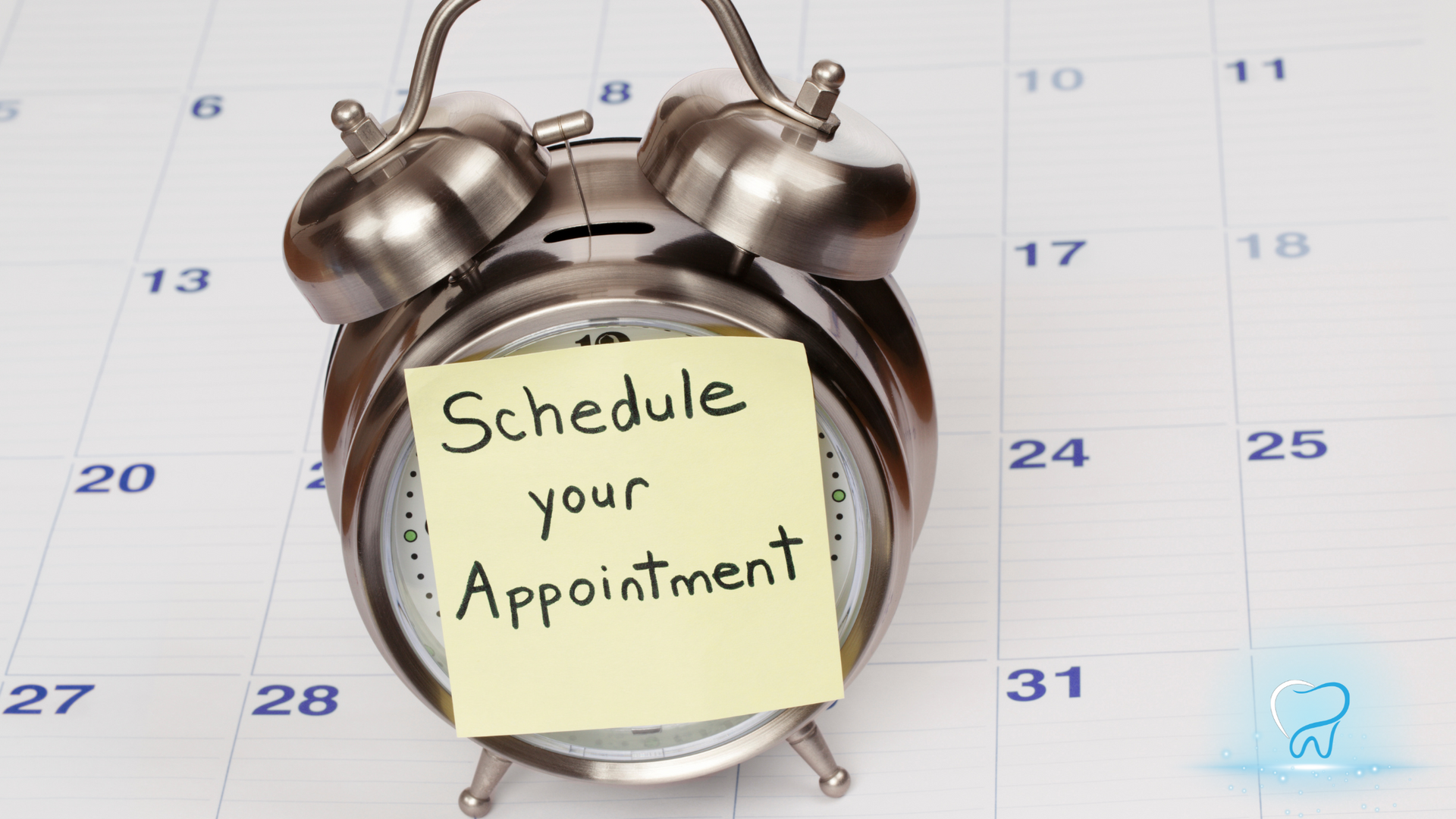 Alarm clock on a calendar with a note reading “Schedule your Appointment.”
