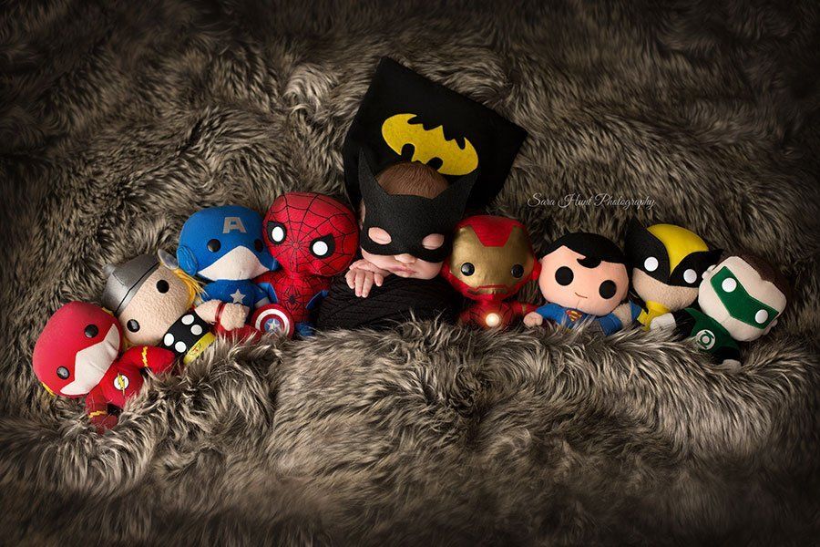 Newborn baby with toy superheroes — Pearland, TX — Sara Hunt Photography