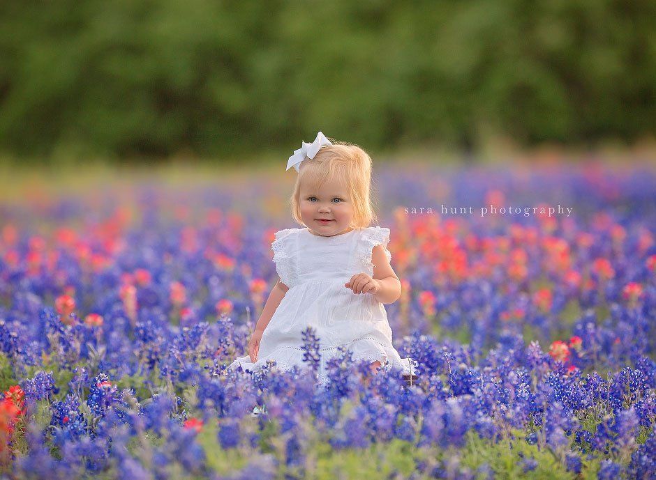 Baby girl with ribbon — Pearland, TX — Sara Hunt Photography