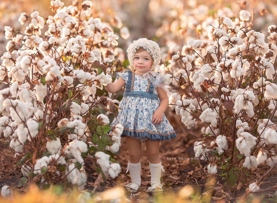 Girl holding cotton — Pearland, TX — Sara Hunt Photography