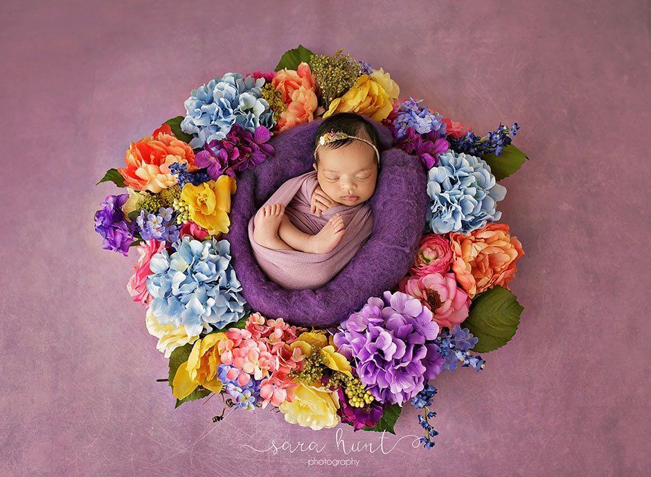 Baby girl surrounded by flowers — Pearland, TX — Sara Hunt Photography