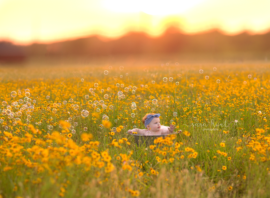 Full shot of baby in the basin with yellow flowers and bubbles — Pearland, TX — Sara Hunt Photography