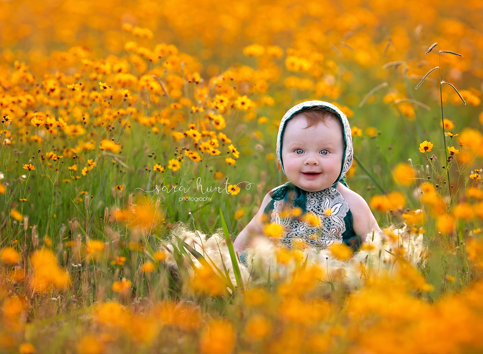 Baby smiling in the field of yellow flowers — Pearland, TX — Sara Hunt Photography