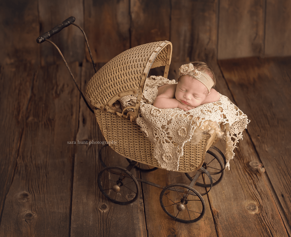 Newborn baby on stroller — Pearland, TX — Sara Hunt Photography