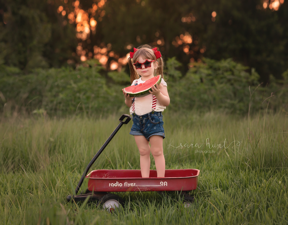 Girl eating watermelon with star-shaped sunglasses — Pearland, TX — Sara Hunt Photography