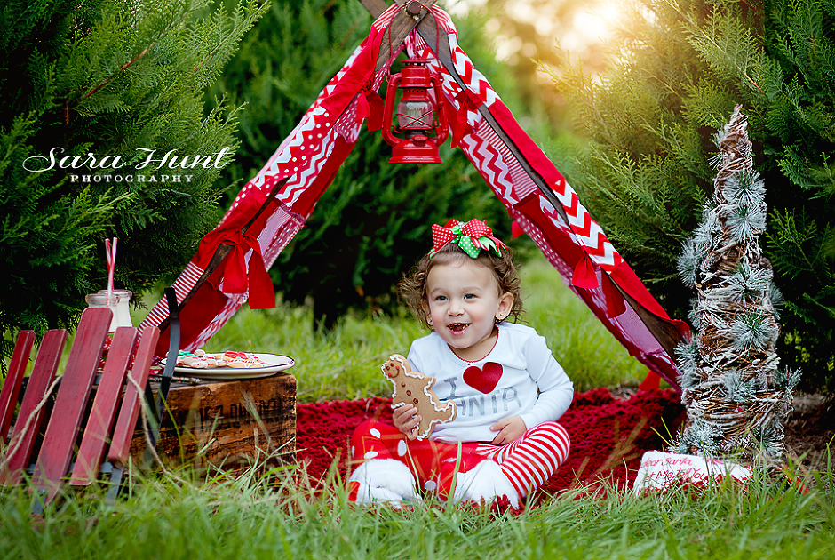 Christmas Tree Farm Mini Session — Happy Girl Eating Gingerbread in Pearland, TX Christmas Tree Farm Mini Session — Happy Girl Eating Gingerbread in Pearland, TX