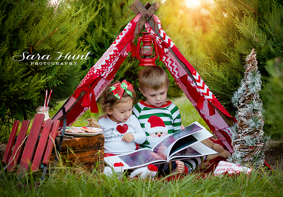 Christmas Tree Photo — Young Boy and Girl Reading a Book in Pearland, TX Christmas Tree Photo — Young Boy and Girl Reading a Book in Pearland, TX