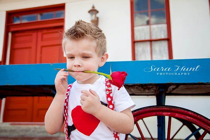 Mr. Valentine Snapshot — Young Boy Holding Rose with His Mouth in Pearland, TX Mr. Valentine Snapshot — Young Boy Holding Rose with His Mouth in Pearland, TX