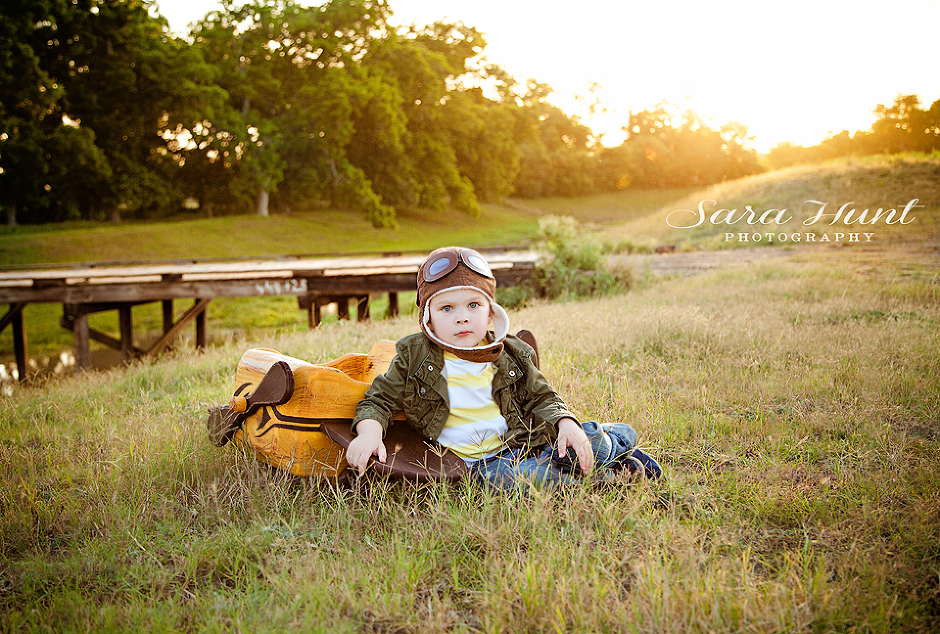 Mr. Aviator Photographer — Kid Sitting with A Plane in Pearland, TX Mr. Aviator Photographer — Kid Sitting with A Plane in Pearland, TX