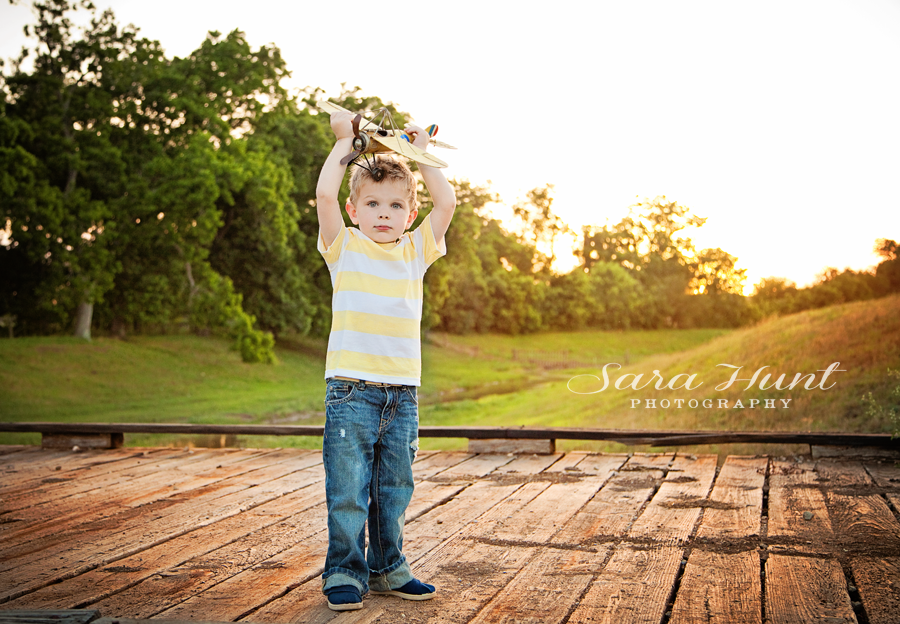Mr. Aviator Session — Kid Holding a Toy Plane in Pearland, TX Mr. Aviator Session — Kid Holding a Toy Plane in Pearland, TX