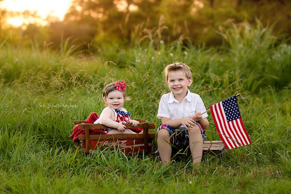 Boy holding an American flag — Pearland, TX — Sara Hunt Photography