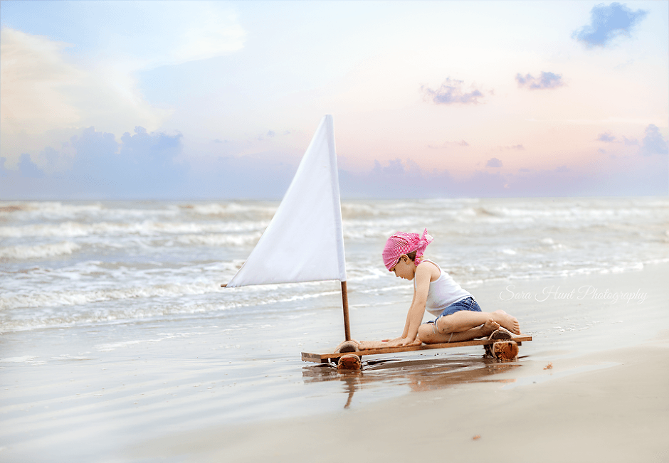 Boy pirate looking at his hands — Pearland, TX — Sara Hunt Photography