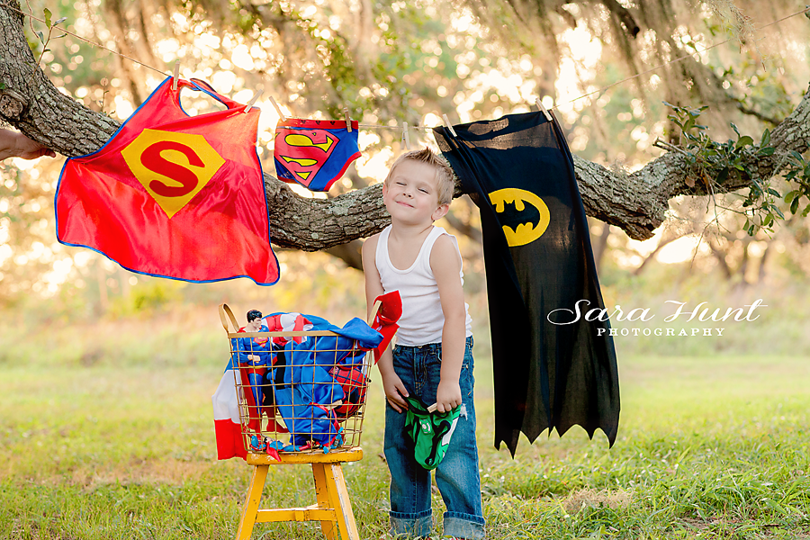 Superhero Birthday Pictorial — Boy Hanging Clothes Outside in Pearland, TX