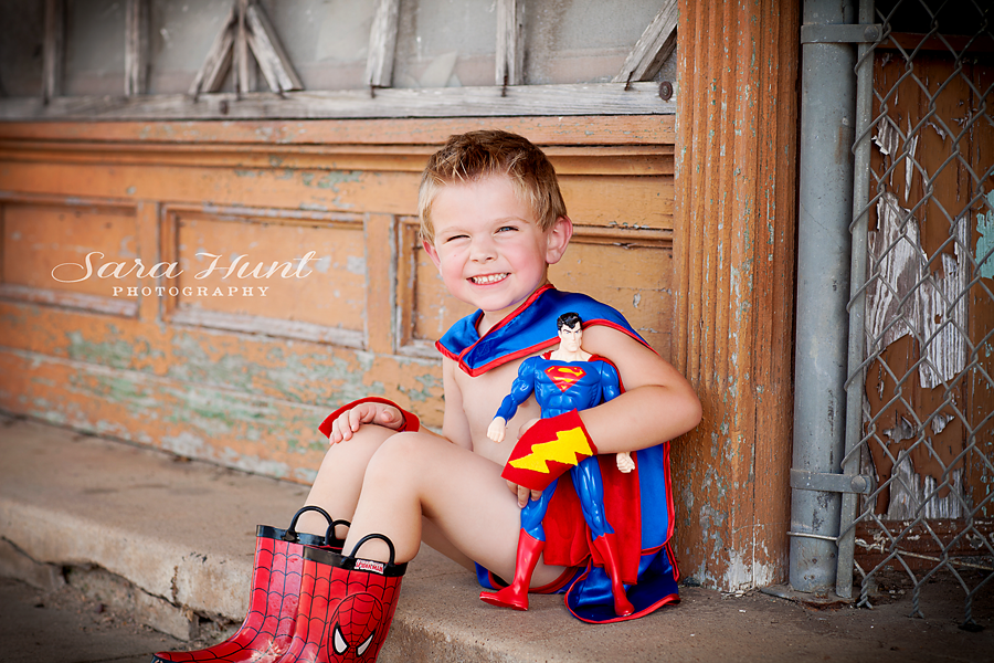 Superhero Birthday Picture — Kid with Toy Superman in Pearland, TX