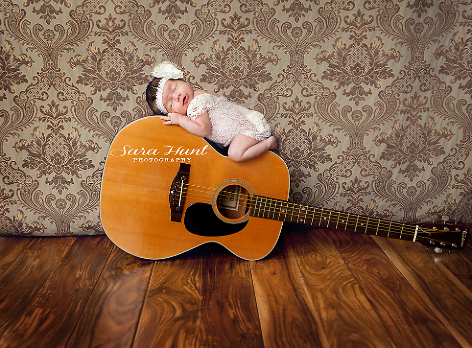 Avery Grace Snap — Baby Sleeping on A Guitar in Pearland, TX Avery Grace Snap — Baby Sleeping on A Guitar in Pearland, TX
