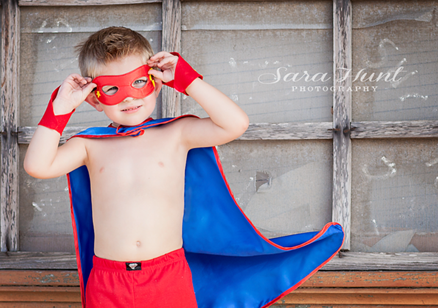 Superhero Birthday Portrait — Kid Holding His Mask in Pearland, TX