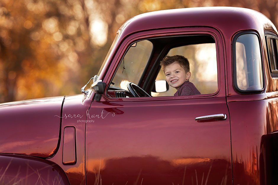 Kid inside the car — Pearland, TX — Sara Hunt Photography