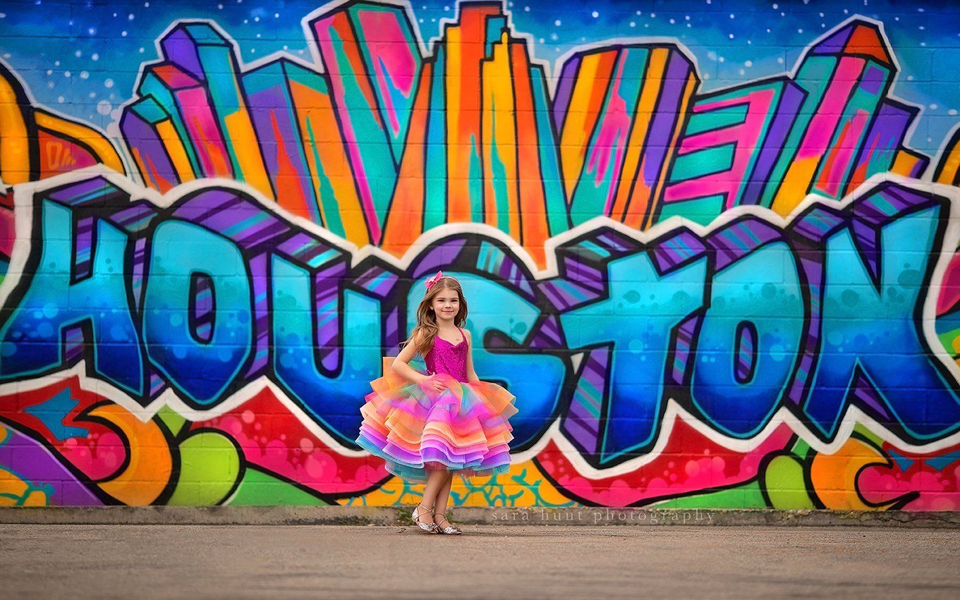 Pretty girl in rainbow cupcake design dress — Pearland, TX — Sara Hunt Photography