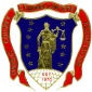 The seal of Essex County, Massachusetts, featuring a blue shield with a gold figure holding scales, dated 1643.